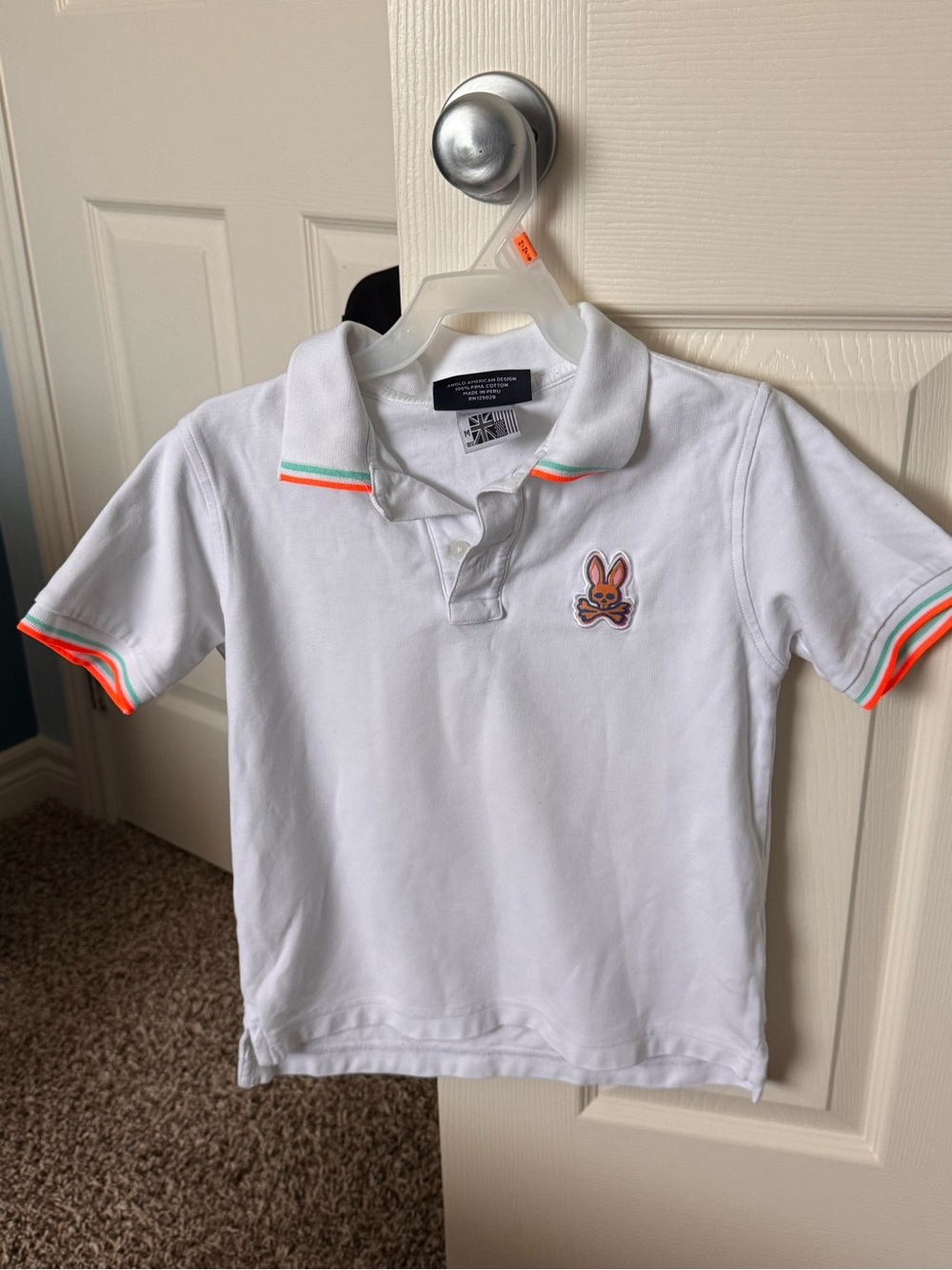 Psycho Bunny White Polo with Neon Orange & Green Trim